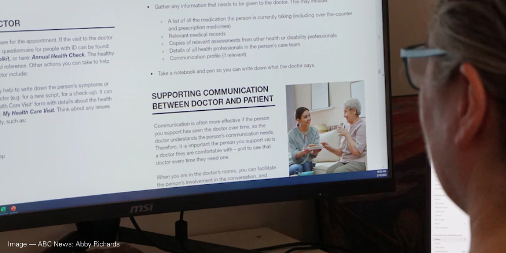 An image of a person using the computer. Part of the person's head is seen where the screen is focused on a written document. The heading for the written document is titled "Supporting Communication between Doctor and Patient".