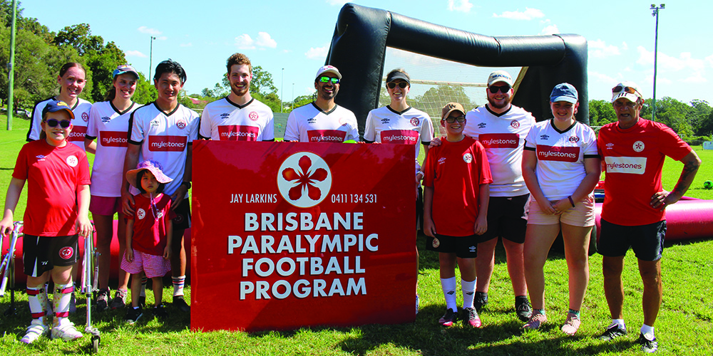 Members of the Brisbane Paralympic Football Program posing for a photo.